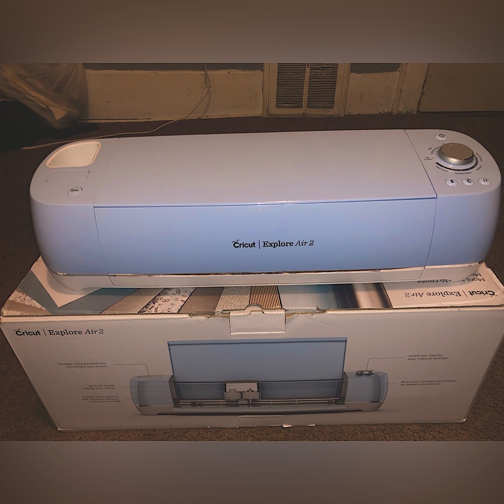 Cricut Explore Air 2, vinyl bundle (some used) and a mini heat press.